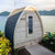 Compact 4 person MiniPOD sauna made of Eastern White Cedar with glass door and asphalt shingle exterior