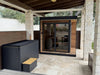 6 Person Modern Outdoor Sauna on covered patio in Texas, with Luxury Cold Plunge, GL6, Öli Saunas