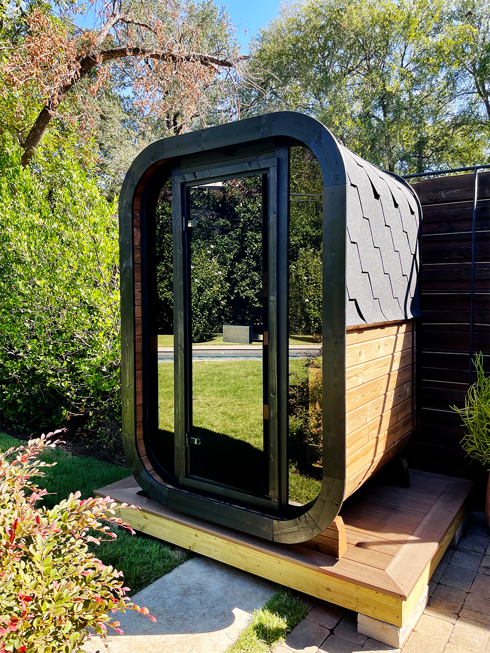 1-2 Person Outdoor Cube Sauna installed on a wooden deck in Texas, CL3G, Öli Saunas