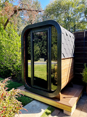 1-2 Person Outdoor Cube Sauna installed on a wooden deck in Texas, CL3G, Öli Saunas