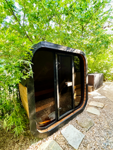 4 Person Outdoor Cube Sauna installed in Texas backyard on gravel, CL5G, Öli Saunas.