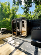 4 Person Outdoor Cube Sauna installed in Texas backyard on concrete pad, CL5G, Öli Saunas.