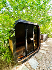4 Person Outdoor Cube Sauna installed in Texas backyard on gravel, CL5G, Öli Saunas.