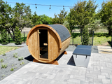 6 Person Outdoor Barrel Sauna installed on a patio in Texas, E8W, with acrylic cold plunge, Öli Saunas