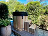 Wooden Barrel Cold Plunge on wooden deck in Texas, Öli Saunas
